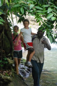 Jackson helps the little ones over the river "trail"