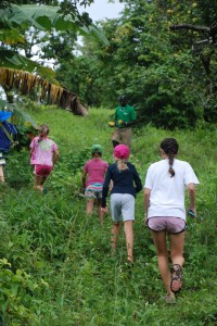 children running after fresh fruit.  gotta love it.