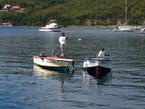 Martin and Eddison in their boats.