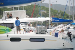 Peter and his dad, Tyler, aboard their chartered catamaran