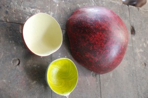 The students make bowls out of the shell of the calabash fruit and sell them.