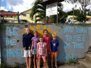 Many schools have bright graffiti with inspirational quotes on teh walls.