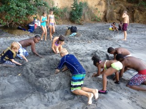 The kids opt to stay on the beach and play.