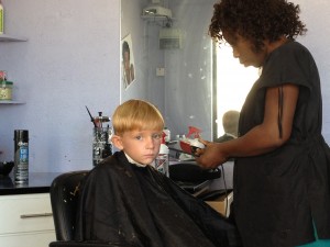 Never happy about getting his hair cut.