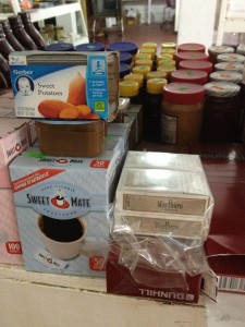 My favorite supermarket organizational plan: the oh-so-thought-out "Baby Food/Coffee/Cigarettes" aisle.