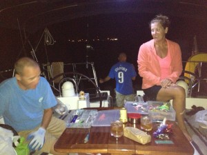 Laughing with our friends in the cockpit while night fishing.  In the TROPICS!