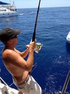 better than science class.  Chris reels in a fish!