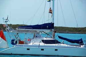 Maggie climbs the mast for her birthday and Reese climbs ours to wave hi!