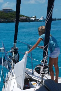 Reese on foredeck, weighing anchor.