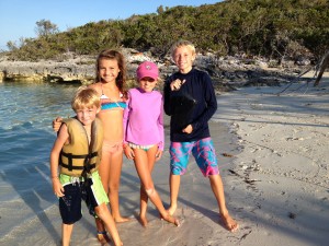 Some of the kids take a break from hauling driftwood on Pipe Cay