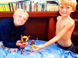 The boys playing Legos together