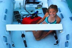 Reese takes a bath in the dinghy.